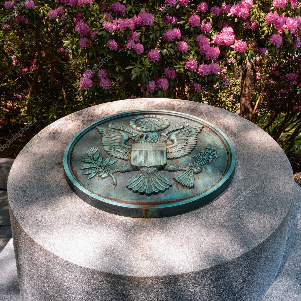 Bourne, Massachusetts - June 3, 2025: National Seal Marker at the Massachusetts National Cemetery.