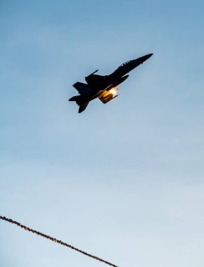 Fighter jet firing flares during the Pitch Black Exercise 2024 at Mindil Beach in Darwin. clipart