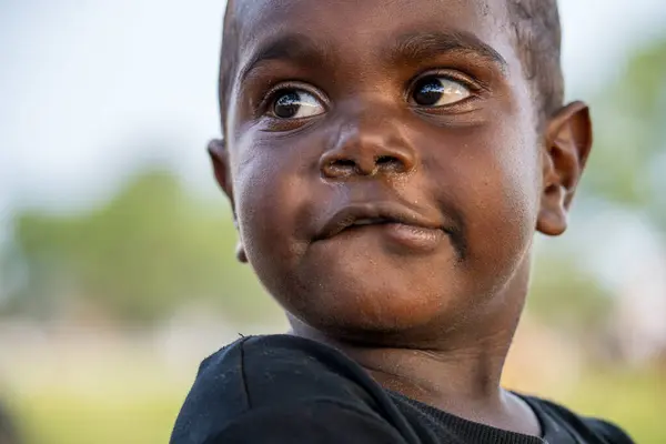 stock image Darwin, Australia - 27 July 2024: portrait of an Australian Aboriginal child at the 2024 Royal Darwin Show.