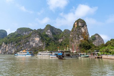 Boat wharf at Surprise Grotto aka Hang Sung Sot in Ha Long Bay, Quang Ninh, Vietnam. clipart