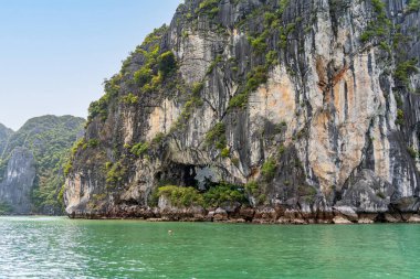 Rock cave in Ha Long Bay, Quang Ninh, Vietnam. clipart