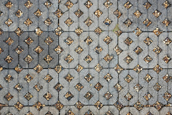 Concrete pavement block pavior driveway and walkway pattern. Cobblestone footpath textured background