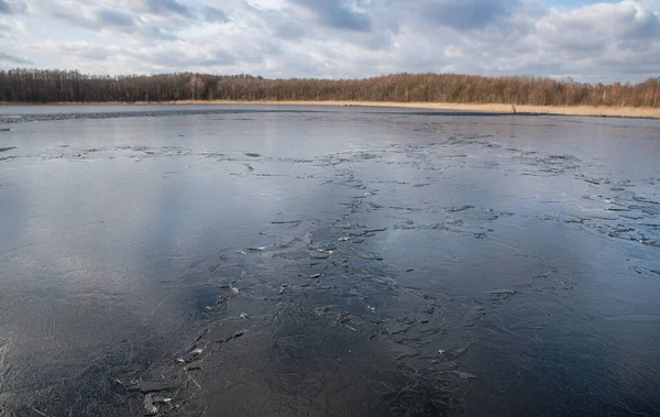 Spring Lake Covered Thin Transparent Cracking Ice — 스톡 사진