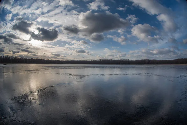 Evening Landscape Spring Lake Covered Thin Cracking Transparent Ice Cloudy — Stockfoto