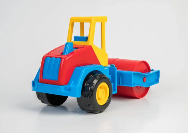 Plastic toy models of construction vehicles. Asphalt roller.