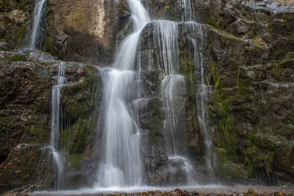 stock image Jets of a waterfall among the stones