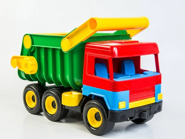 Multi Gekleurde Plastic Speelgoed Vrachtwagens Voor Kinderen Games Een Witte — Stockfoto