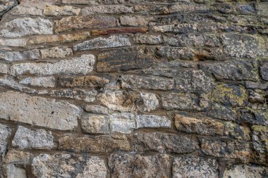 Taş bloklardan yapılmış eski bir duvarın dokusu.
