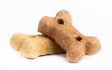 Detail of dog treats, delicacy bones isolated on white background clipart