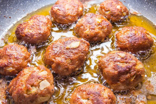 Fry the meatball in oil in a pan