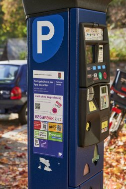 Berlin, Germany - October 30, 2022: Parking ticket machine to pay for a temporary parking space.