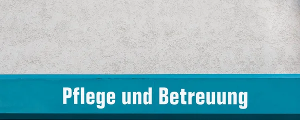 Sign Wall Nursing Retirement Home Text Pflege Und Betreuung German — Stock Photo, Image