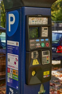 Berlin, Germany - October 30, 2022: Parking ticket machine to pay for a temporary parking space.