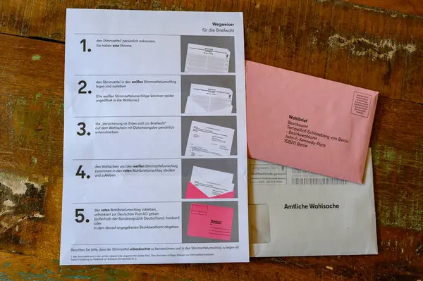 stock image Berlin, Germany - June 2, 2024: Explanations with text and images on sending postal voting documents.
