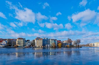 Winter scene at the frozen Dahme river in Berlin Koepenick. clipart