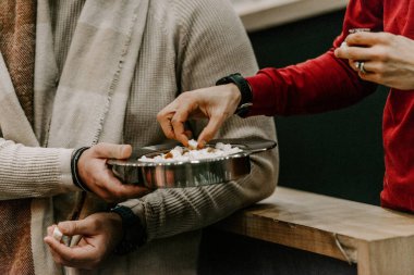 Communion with bread and wine during the service in the assembly