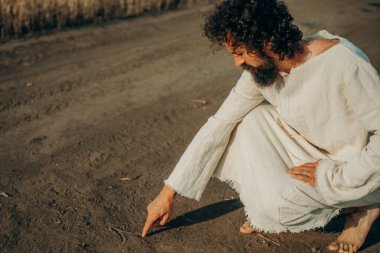 İlahi Senaryo: İsa 'nın Kumda Parmağı