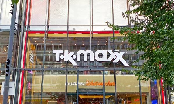 stock image Dusseldorf, Germany - October 9. 2022: Front glass facade with logo lettering of TK Maxx store