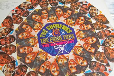 Viersen, Germany - May 9. 2022: Closeup of soul vinyl record motown album cover the magnificent 7 with Supremes and Four Tops in 60s clipart