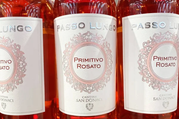 stock image Viersen, Germany - May 9. 2023: Closeup of three Passo Lungo primitivo rosato wine bottles