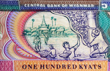 Myanmar 'daki tapınak yenileme sahnesi 100 Kyat para birimi banknotu (merkeze odaklan)