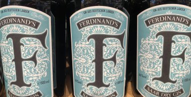 Viersen, Germany - April 3. 2024: Closeup of Ferdinand Gin bottles in german store shelf (focus on center) clipart