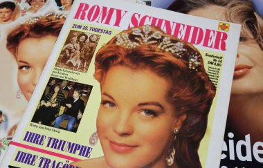 Viersen, Germany - March 9. 2024: Closeup of magazine page with scene from austrian Sissi Movie from 50s with Romy Schneider and Karl Heinz Bohm clipart