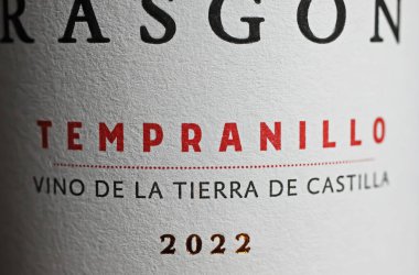 Viersen, Germany - May 1. 2024: Closeup of spanish Tempranillo Rasgon red wine bottle lable 2022 clipart