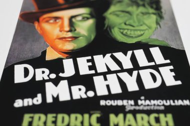 Viersen, Germany - May 9. 2024: Detail of Dr. Jekyll and Mr. Hyde official Cinema film poster  with Fredric March from 1931 (focus on center) clipart