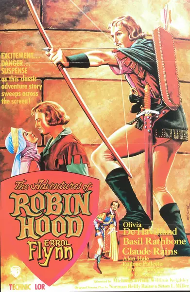 stock image Viersen, Germany - May 9. 2024: The Adventures of Robin Hood  film cinema poster detail with Errol Flynn and Olivia de Havilland from 1938 (focus on center)