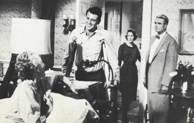 Viersen, Germany - June 8. 2024: This Earth is mine film scene with Rock Hudson, Jean Simmons, Dorothy McGuire and Kent Smith from 1959 in old magazine (focus on person left of center) clipart