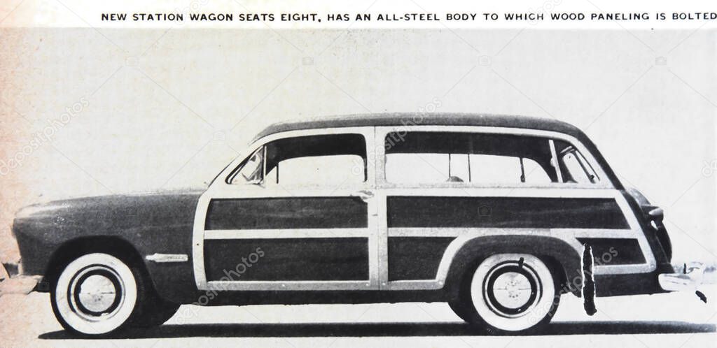 Viersen, Germany - June 9. 2024: Woody Ford Station Wagon vintage advertisement in US american magazine from 1948 (focus on center of car)