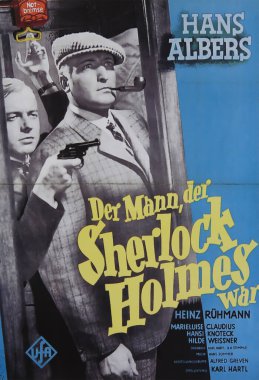 Viersen, Germany - May 9. 2024: The Man Who Was Sherlock Holmes film cinema poster detail (German version) with Hans Albers and Heinz Ruhmann from 1937 (focus on center) clipart