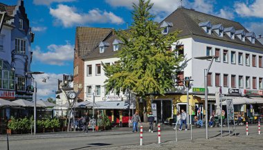 Monchengladbach (Alter Markt), Germany - September 30. 2024:  Central old market square with restaurants and cafes in summer clipart