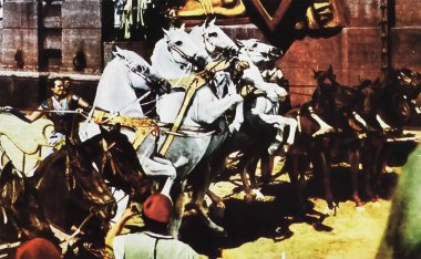 Viersen, Germany - May 9. 2024: Cinema lobby card with Ben Hur film scene in roman arena with from 1959 (focus on center) clipart