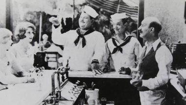 Viersen, Germany - July 9. 2024: Men O War film lobby card detail with Stan Laurel and Oliver Hardy from 1929 (focus on central persons) clipart