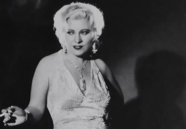 Viersen, Germany - July 9. 2024: Portrait of actress Mae West from 1920s (focus on face) clipart