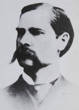 Viersen, Germany - July 8. 2024: Old magazine portrait photo of american lawman Wyatt Earp ca. 1880s (focus on face) clipart