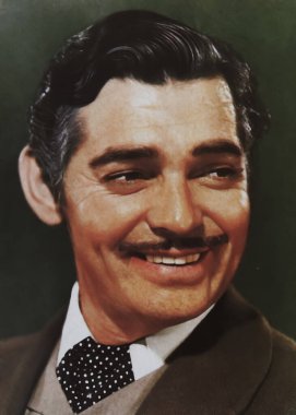 Viersen, Germany - June 2. 2024: Old magazine promotion portrait photo of american actor Clark Gable as Rhett Butler in Gone with the Wind from 1939 (focus on face) clipart