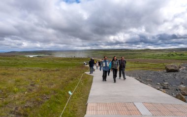 Gullfoss, Iceland - July 26th 2022: Tourists walking back from the Gulfoss Waterfall, Golden Circle, Iceland