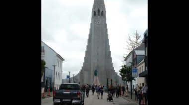 The Hallgrimskirkja white concrete church overlooking Skolavordustigur street in central Reykjavik, Iceland