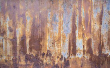 Paslanmış çelik levhalara, turuncu, sarı ve mavi renklere yakın dur.