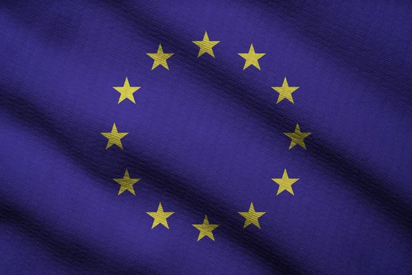 Close up of waving of European Union or EU silk flag for Independence Day concept.