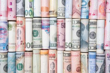 Uluslararası banknotların en üst görünümü, para transferi ve yatırım ticaret öngörüsü kavramı için rulo.
