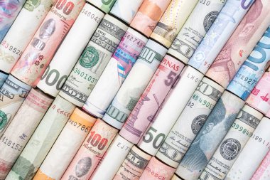 Uluslararası banknotların en üst görünümü, para transferi ve yatırım ticaret öngörüsü kavramı için rulo.