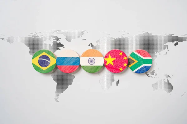 Brazil Russia India China and South Africa flag on world map for BRICS economic international cooperation concept.