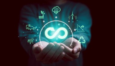 Ebediyeti tutan eller, sınırsız, iş büyümesi ve çevre için dairesel ekonominin sembolü olan sonsuzluk..