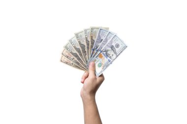 Dolar karşılığı beyaz arka planda el ele tutuşan Amerikan doları banknotları dünyanın en önemli para birimidir..