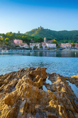 Collioure bay with rocks and beach at morning at Occitanie in France