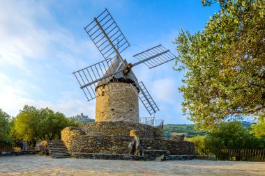 Windmill of Collioure with mornong lights at Occitanie in France